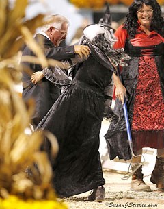 Axel Steiner dancing with the ring crew during the drag break on freestyle night at 2013 Dressage at Devon :: Photo © Sue Stickle