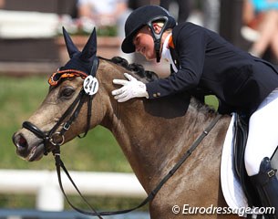 Lisanne Zoutendijk pats Champ of Class after a successful team test at the 2013 European Pony Championships :: Photo © Astrid Appels