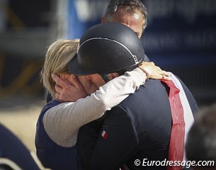 Roger Yves Bost kisses his wife after winning individual gold at the 2013 European Show Jumping Championships