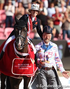 Charlotte Dujardin doing a hat swap with ringmaster Pedro Cebulka