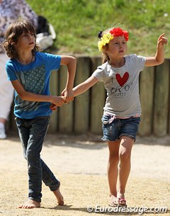 The kids of Jorinde Verwimp's trainer Anky van Grunsven root for Belgium this time!