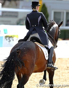 Kim Jesse is wearing an interesting tail coat riding Mieko Yagi's Charming (by Champus)