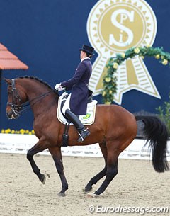 Austrian Renate Voglsang on Fabriano. This photo seems to be a piaffe but it was actually taken in the pirouette