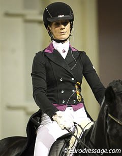 German Jana Kun preparing herself for the Grand Prix Knock Out, a show concept developed by the Helsinki Horse Show. Two riders show GP movements in mirror reflection and judges assess who can move to the next round.