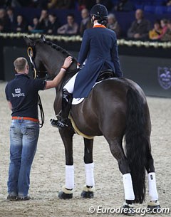 Danielle Heijkoop's Siro takes time for a stretch during the prize giving ceremony