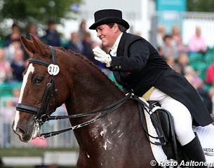 Stephanie Croxford gives Mr President a pat after his last Grand Prix competition ride in his career at the 2013 British Dressage Championships :: Photo © Astrid Appels