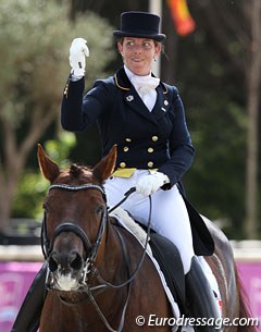 Claire Gosselin is happy with her test and raises her first in the air