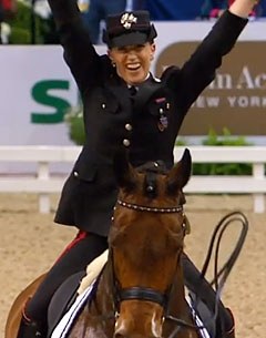 Valentina Truppa raises her arms in the air at the end of her freestyle