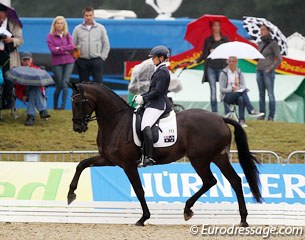 Hayley Beresford riding Rebana W (by Rosario) in the rain