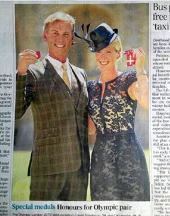 Carl Hester and Laura Tomlinson with their MBE medals