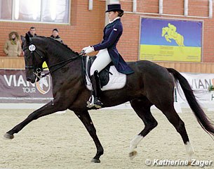 Polina Afanasieva and Tacolando Triple R in the CDI 3* Grand Prix at the 2013 CDI-W Zhashkov in Ukraine :: Photo © Katherine Zager