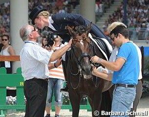 Helen Langehanenberg kissing coach Klaus Balkenhol