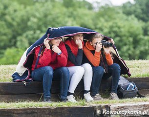 Spectators huddled together