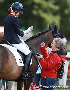 Danish chef d'equipe Rigmor Kristensen gives Phoebe Peters a pep talk