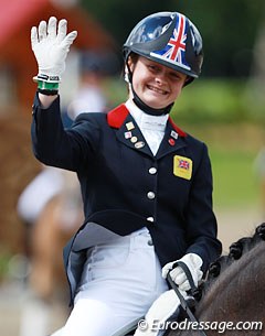 Phoebe Peters waves to her fans