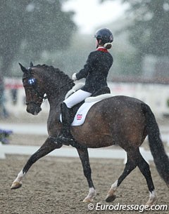 Phoebe Peters and SL Lucci rode during a big downpour of rain