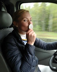 Jeanna Hogberg kisses her silver medal on her drive home from the 2014 Swedish Championships