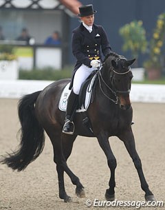 Former German pony team rider Svenja Meyer on Rania M. This horse has a very rhythmical piaffe-passage with super transition but overall could have more flexion in the joints. 