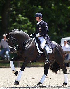 Rath warming up Totilas at the 2014 CDI Kapellen