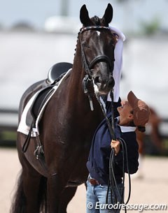 Cesar Parra's long time groom Jennifer Mandracia tries to put the ribbon on Van The Man