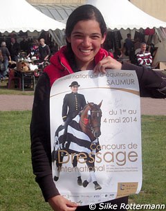 The happy fan with her signed poster