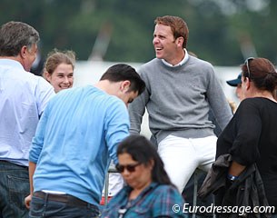 German Grand Prix rider Steffen Frahm hangs out at the warm up ring