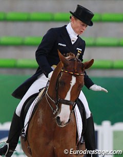 Isabell Werth is well known for patting her horses on the back. However, she does this before her test begins :: Photo © Astrid Appels