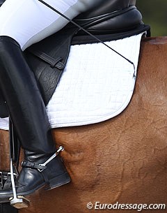 Are spurs and whip used in the right way? Are we having a discussion? Do we need to have a discussion? :: Photo © Astrid Appels