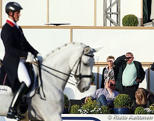 Breeders and owners Julie and Jon Deverill watching Michael Eilberg compete their Half Moon Delphi