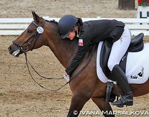 Anna Wojtkowska hugs her pony Moreliom Americum Dingo