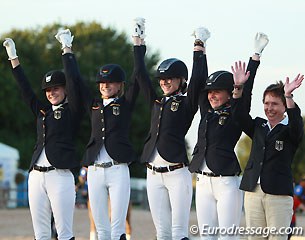 The German team with Lana Raumanns, Helen Erbe, Linda Erbe, Nadine Krause, and team trainer Cornelia Endres celebrates silver on the podium