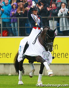 While the other dressage riders were too afraid to make a lap of honour on the wet grass, Dujardin couldn't be bothered and treated the audience to a wonderful tour around the stadium celebrating her gold medals