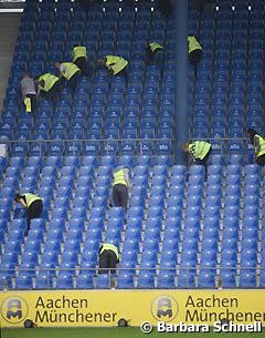 The cleaning crew preparing the stadium