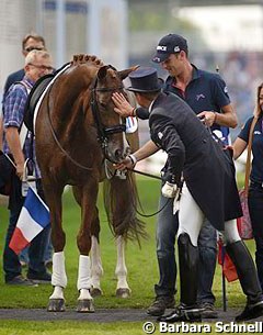 Pierre Volla pats Badinda Altena after their Grand Prix ride