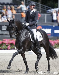 Diederik van Silfhout on the breeding stallion Cupido (by Daddy Cool x Jazz) at the 2015 Dutch Dressage Championships :: Photo © Dirk Caremans