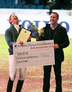 At the 2015 CDI-W Gothenburg Patrik Kittel receives the 2,000 euro cheque from Kristian von Krusenstierna during the Swedish Dressage Trainer of the Year ceremony
