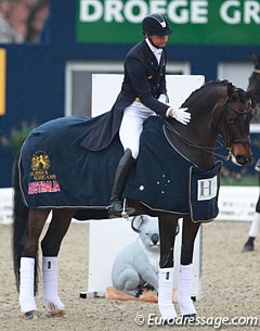 Patrik Kittel pats Deja during the prize giving ceremony