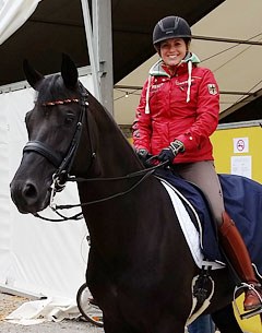 Kristina Sprehe leaving the stables to school Desperados the day before the competition