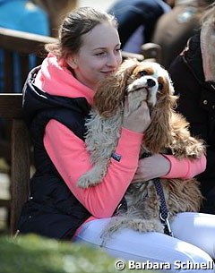 Julia Barbian cuddling her dog