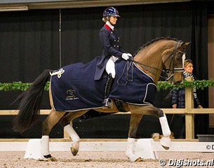 Charlotte Fry and Clearwater win the Under 25 at the 2015 CDI Roosendaal Indoor :: Photo © Digishots