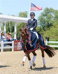 Lisa Wilcox and Gallant Reflection HU win the 2015 U.S. Young Horse Championships in the 6-year old division :: Photo © Sue Stickle