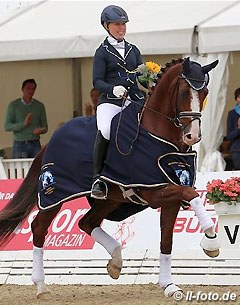 Yvonne Osterholm and Quarton win the 6-year old consolation finals at the 2015 World Young Horse Championships :: Photo © LL-foto