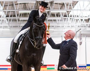 Judge Waclaw Pruchniewicz congratulates Katharina Haas