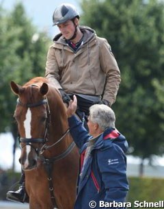 Michael Eilberg on Woodlander Farouche flanked by dad Ferdi