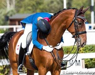 Polish junior riders champion Zuzanna Haber hugs Don Crusoe