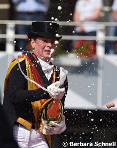 Grand Prix Special gold medallist Isabell Werth popping the champagne