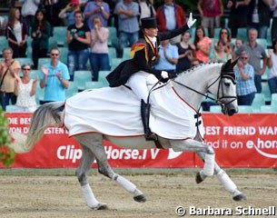 Isabell Werth doing her lap of honour on Caresse, a jumper bred and owned by Isabell's sponsor Madeleine Winter-Schulze and in training with Eva Bitter