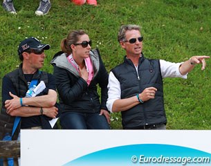 Ian Cast, Charlotte Dujardin, and Carl Hester watching the Nations' Cup Grand Prix