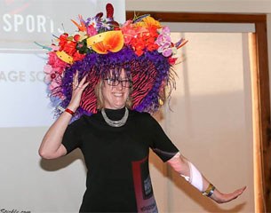 Angel Gunn models her winning Carmen Miranda inspired hat at the competitors' banquet.