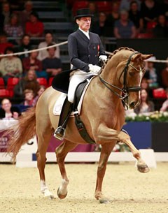 Emile Faurie and Weekend Fun competing in the World Cup Qualifier at the 2016 CDI-W London Olympia Horse Show